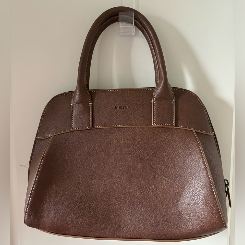 Brown Roots vegan leather handbag.